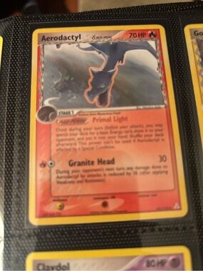 Holon phantoms Pokemon Aerodactyl Trading Card - Red, Yellow, Black